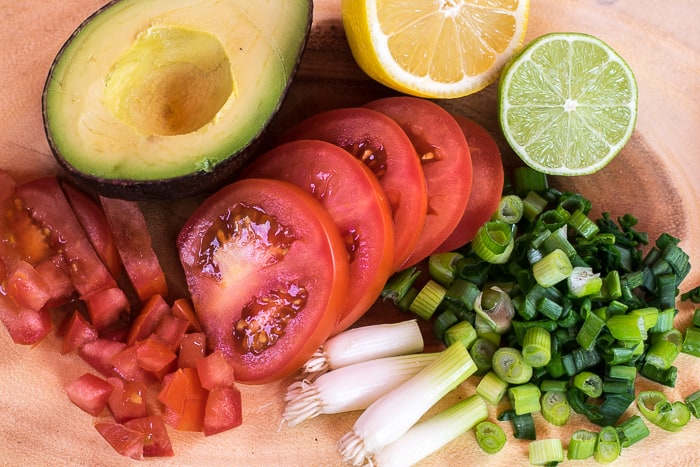 picture of cut up ingredients for guacamole