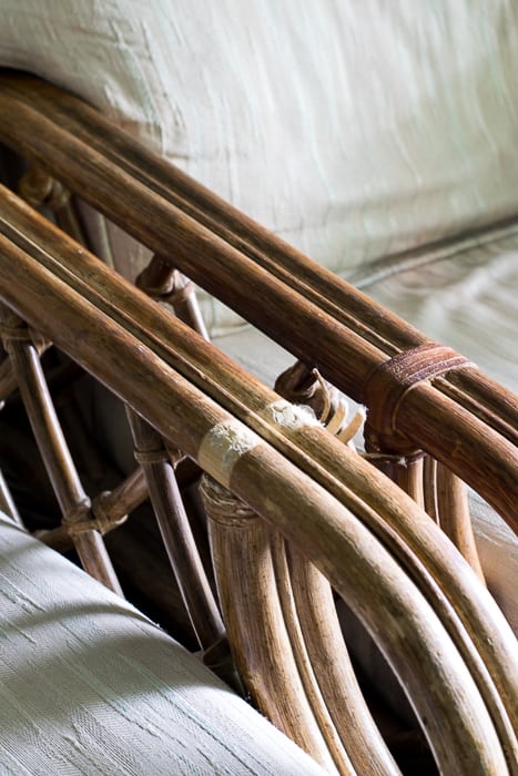 Image showing diy mistake closeup view of recliner chair arms with leather straps missing