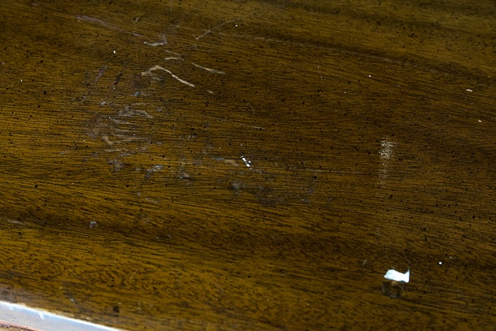 picture of dresser top showing scratches