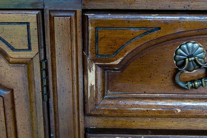 Picture showing damage on a wooden dresser drawer