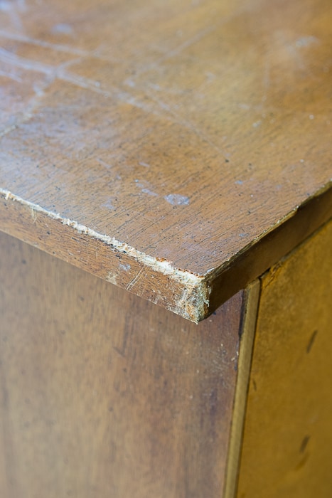 Picture of damaged corner of wood dresser