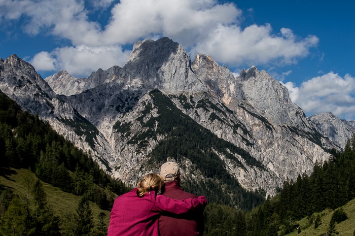 picture of two people looking at a mountain