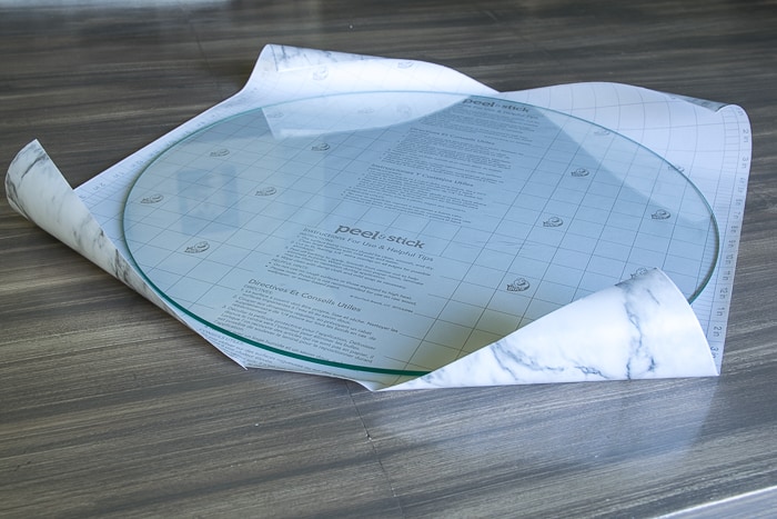 picture showing round glass top on shelf liner paper