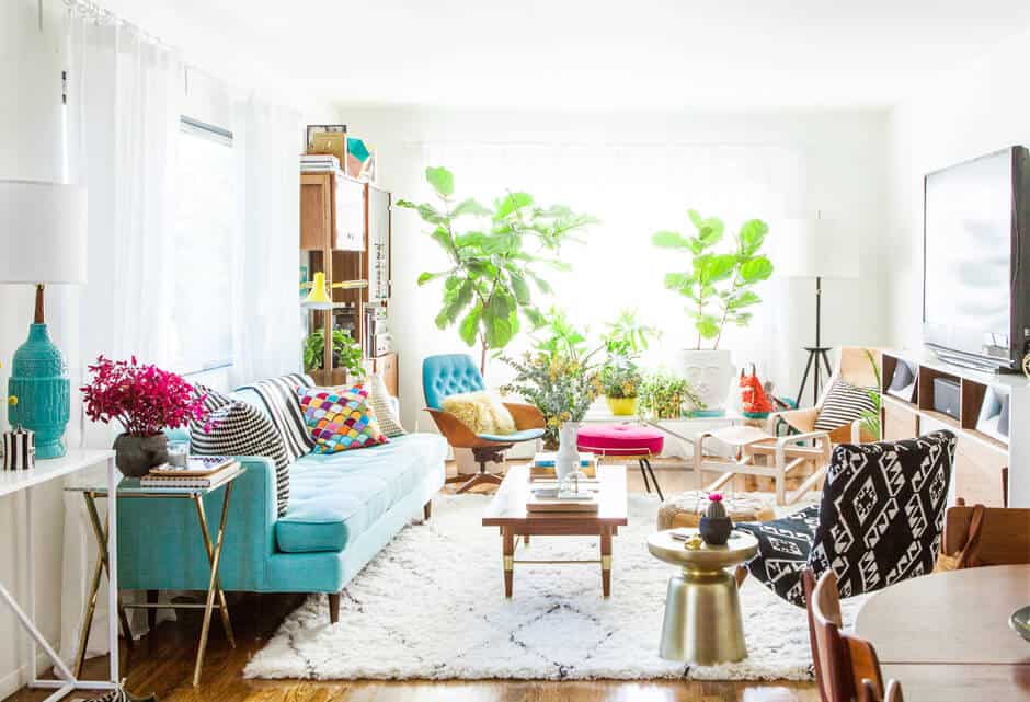 A wonderful example of a bright and happy, colorful living room decorated mid century modern style