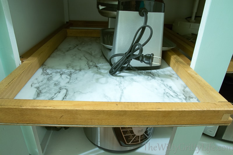 even the pullout drawers have marble liners