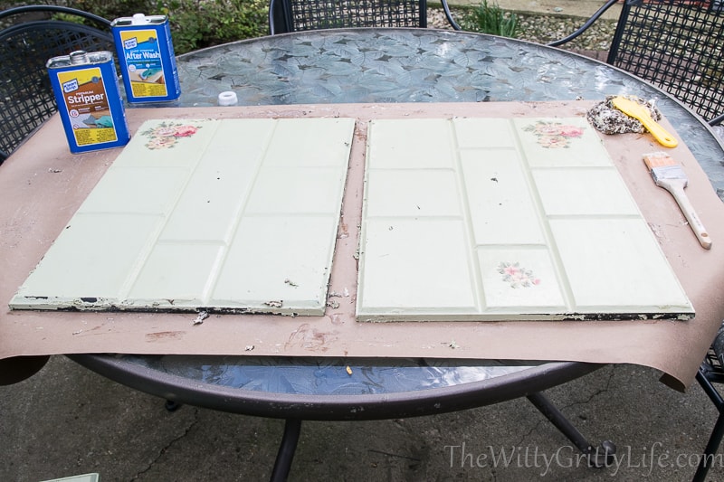 the cabinet doors outside with the first coat of stripper applied