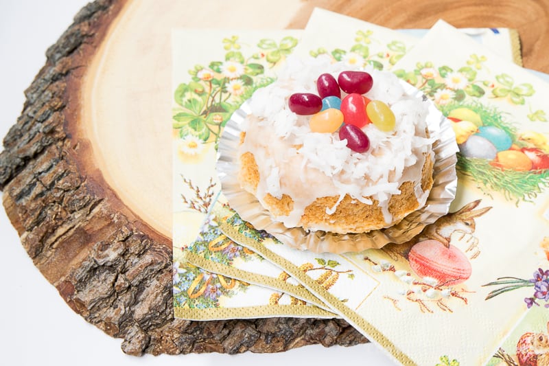 Easter bunny nest on wooden board and Easter napkin