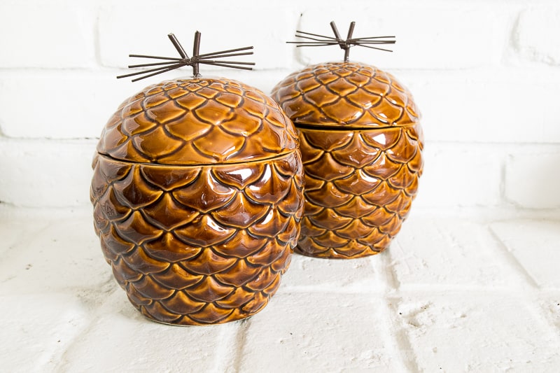 two ceramic pine cone cookie jars