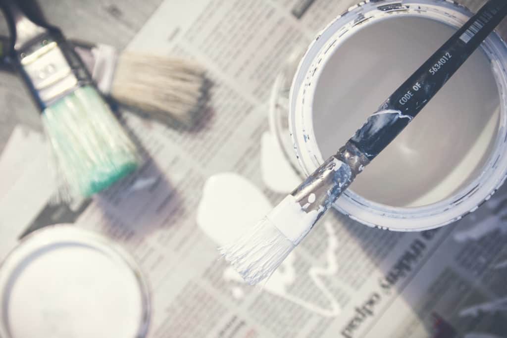 top view of paint can and brushes