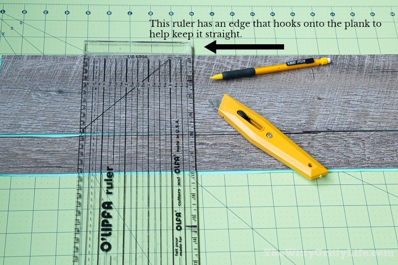 Graphic showing the edge of the ruler that hooks to the plank