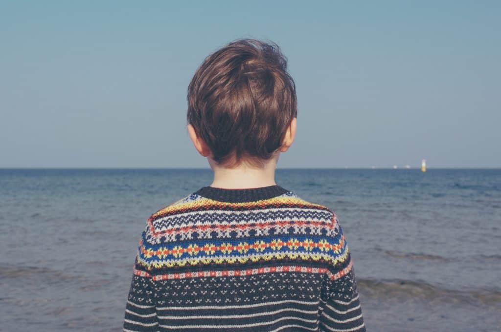 boy looking at water