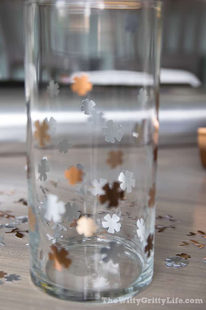 glass vase with metallic flowers 