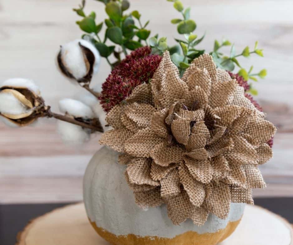 finished gold and concrete pumpkin planter