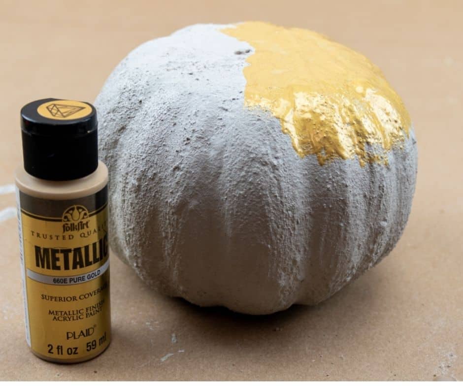 concrete pumpkin with gold paint