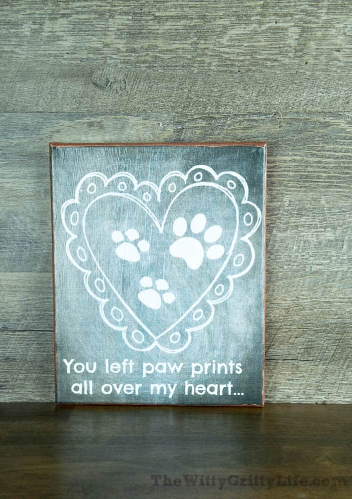 Diy wall sign with quote "you left paw prints all over my heart".