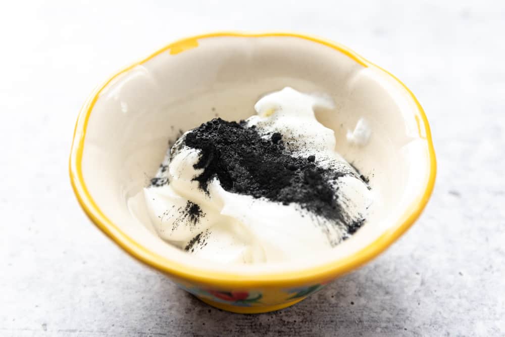 yogurt and charcoal in a bowl