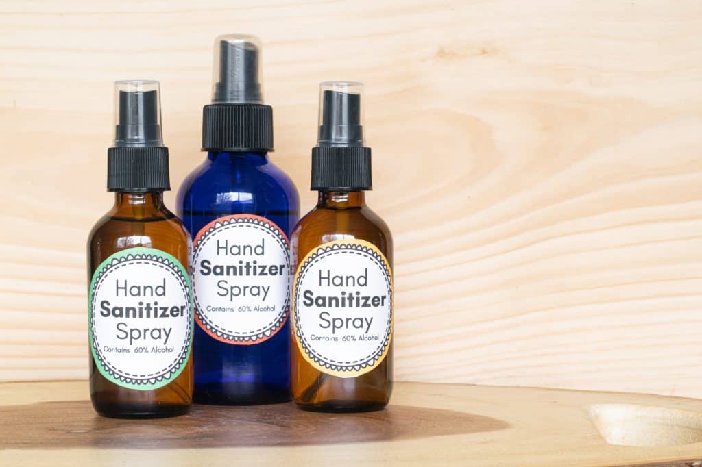 hand sanitizer spray with alcohol three different bottles