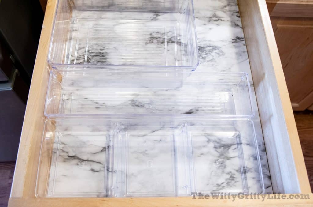 kitchen drawer organization with clear plastic bins