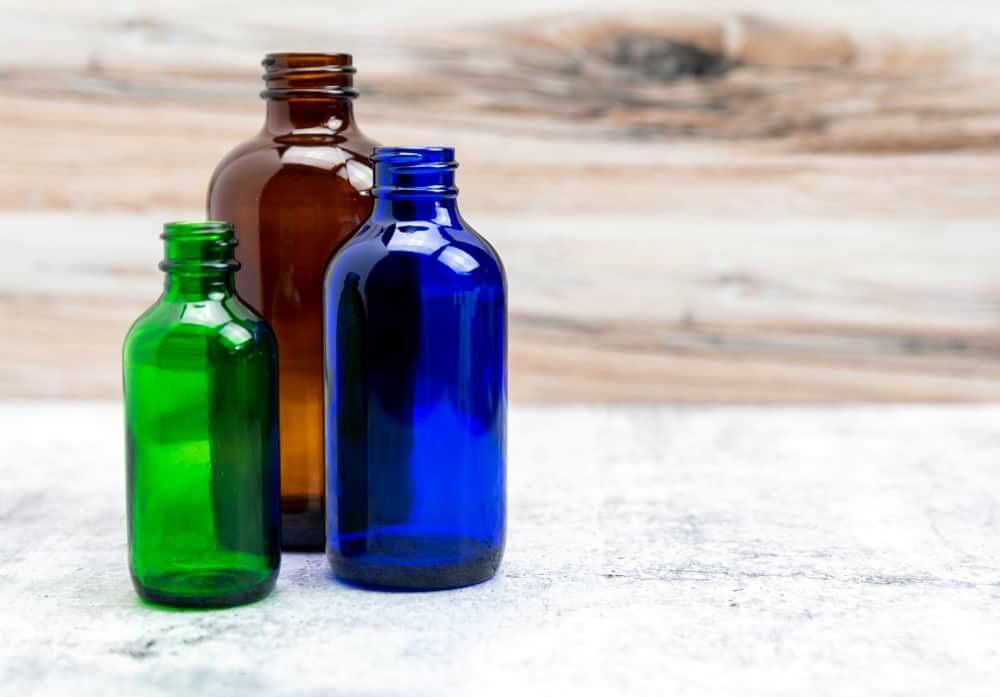 Brown, green and blue glass bottles