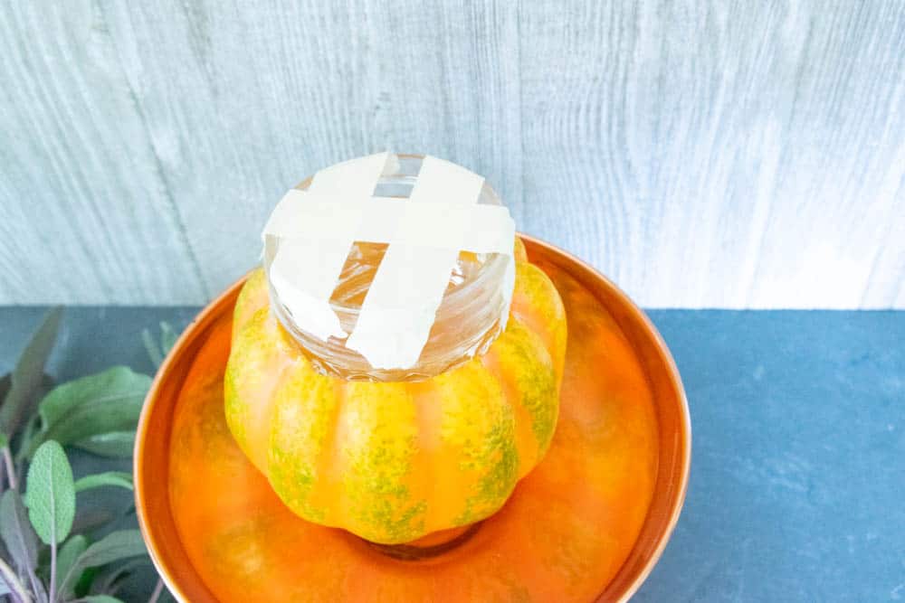 pumpkin,glass jar with masking tape