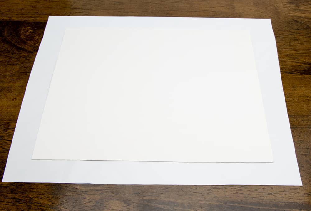 poster board on adhesive liner paper