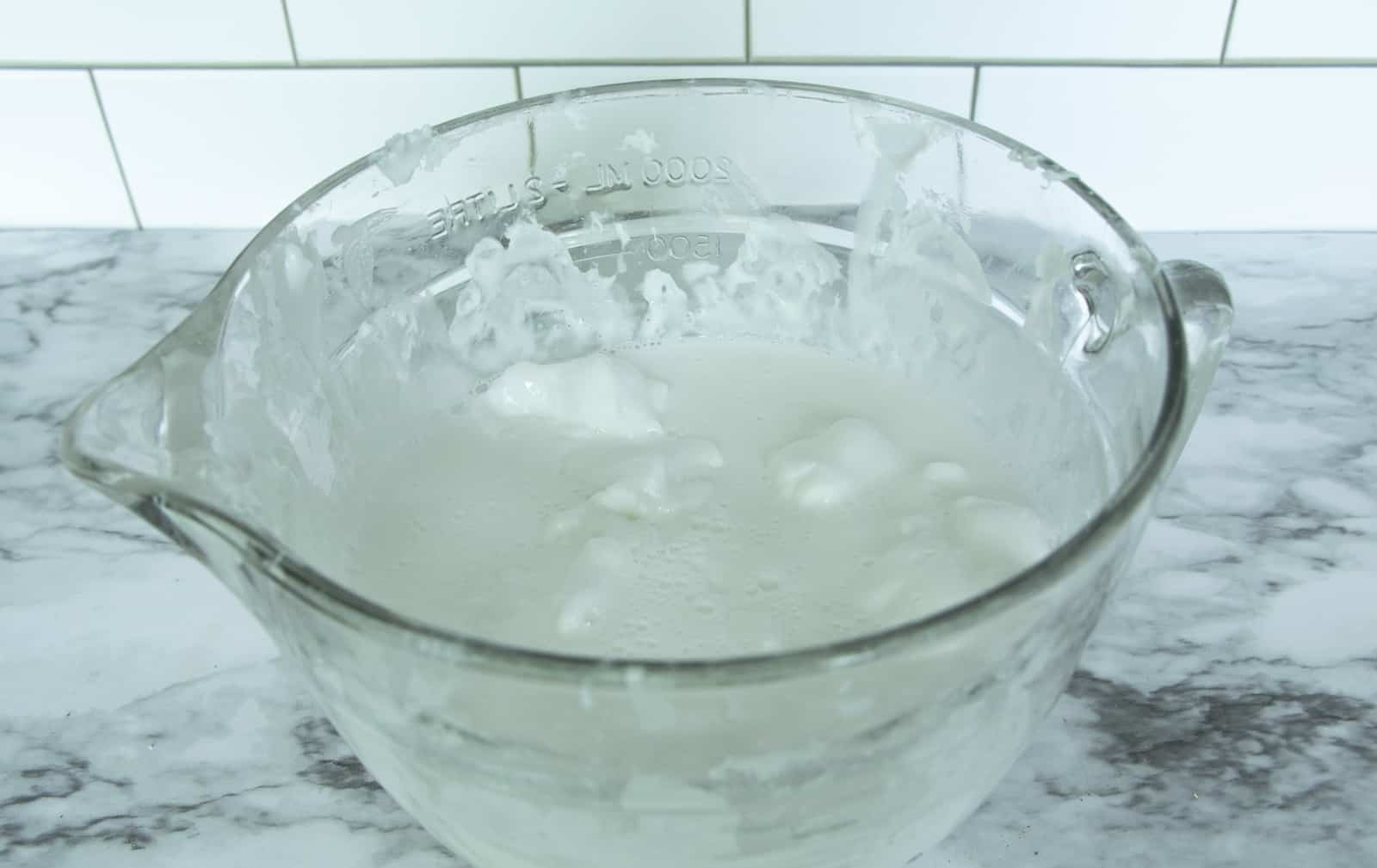 pour and melt soap that has been heated and is nearly melted