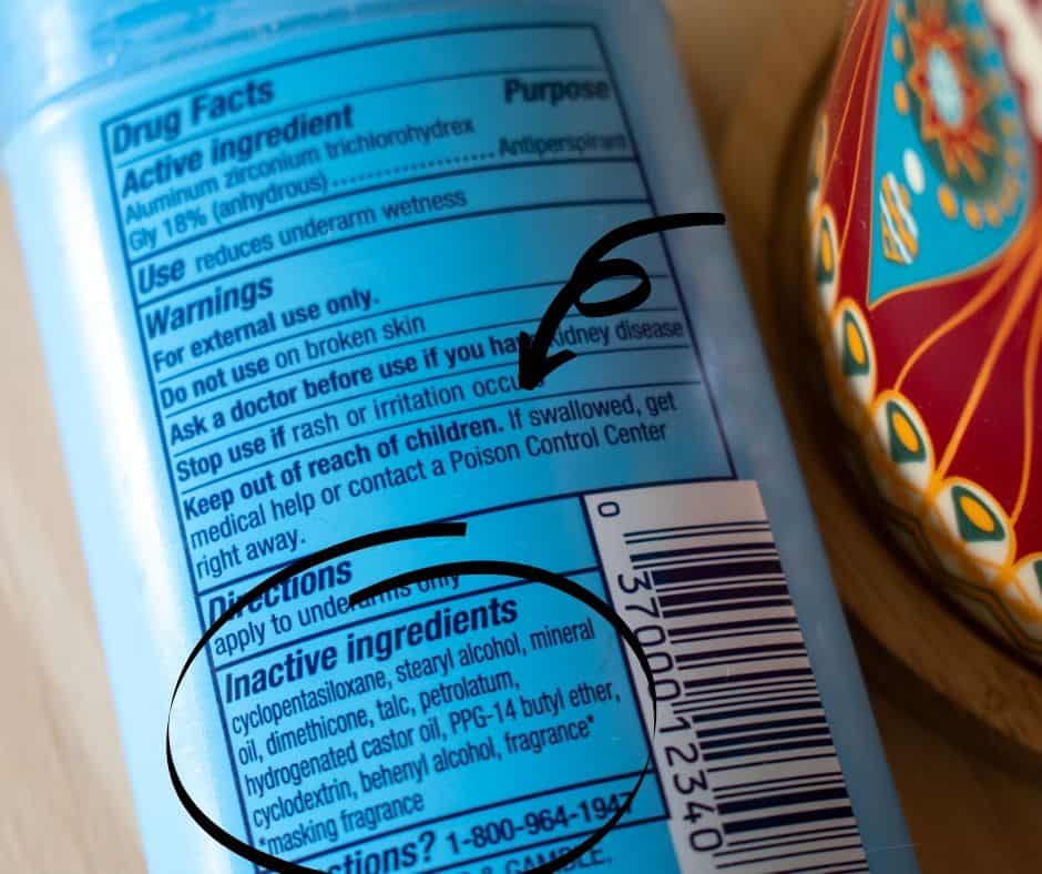 image showing back of blue deodorant stick with ingredients circled and arrow pointing at caution statement