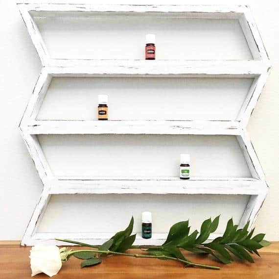 rustic white wood shelf for essential oils orgranize and display