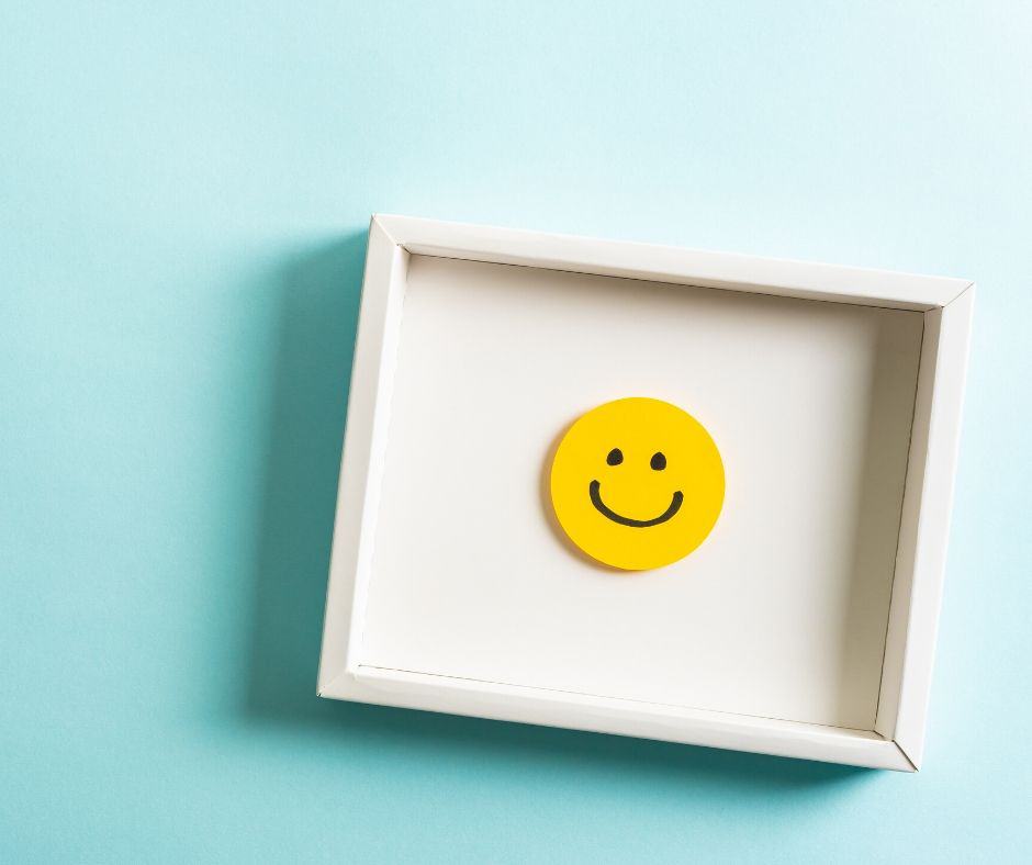 picture of a yellow smiley face in a frame